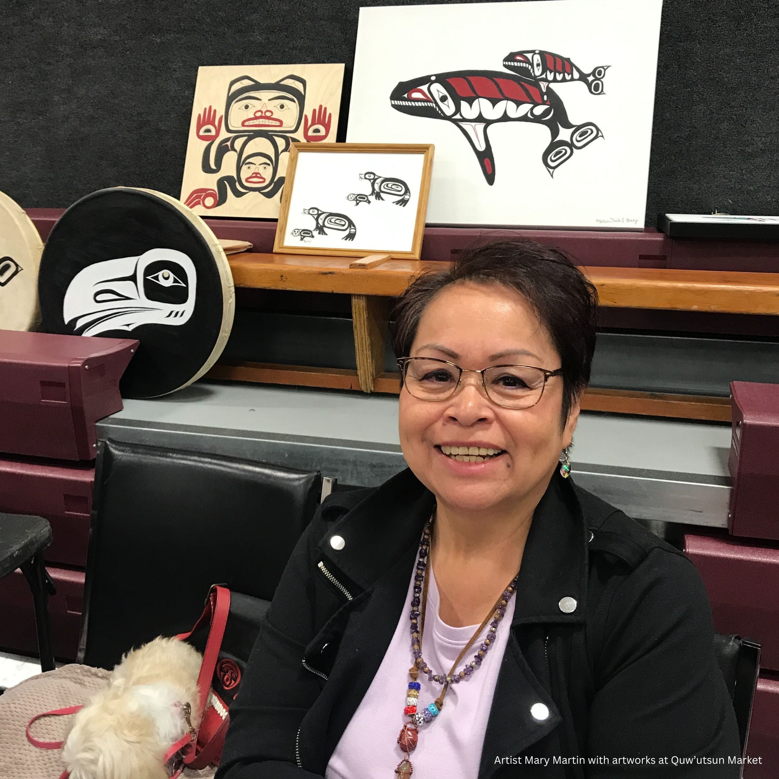 Artist Mary Martin with some of her artworks at the Quw’utsun Market in Duncan. Photo by Elizabeth Nolan